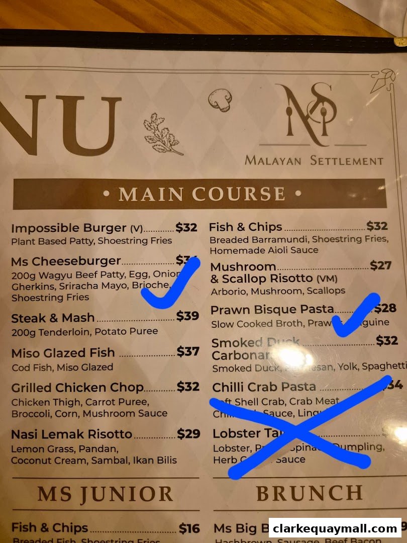 A menu from Malayan Settlement featuring main courses and brunch items.