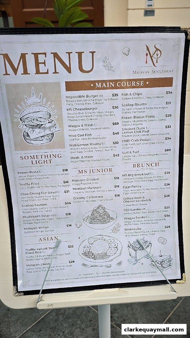 A menu from Malayan Settlement featuring main courses, junior meals, and brunch options.