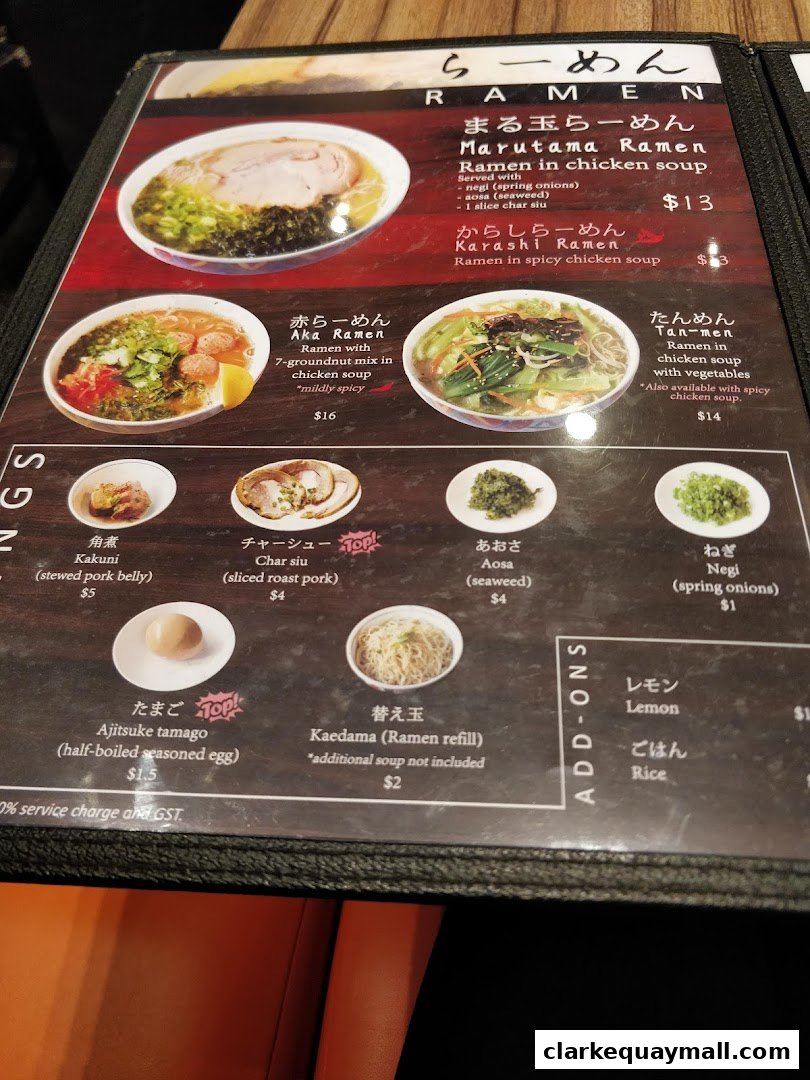 A menu from Marutama Ramen featuring various ramen dishes and add-ons.