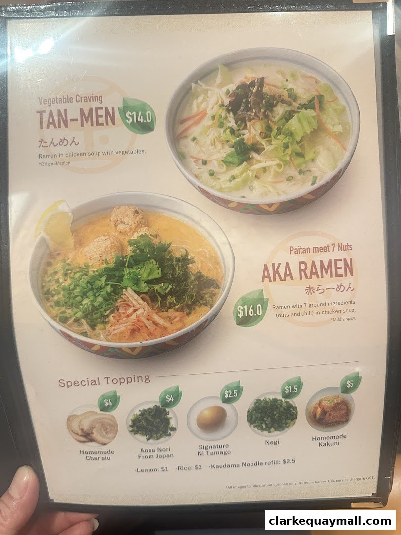 A menu featuring two ramen dishes and various special toppings with prices.