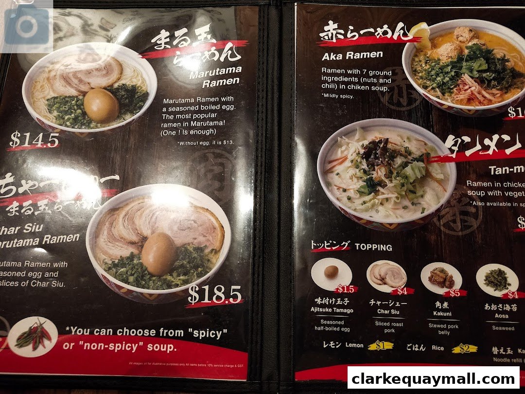 A menu from Marutama Ramen featuring various ramen dishes and toppings with prices.