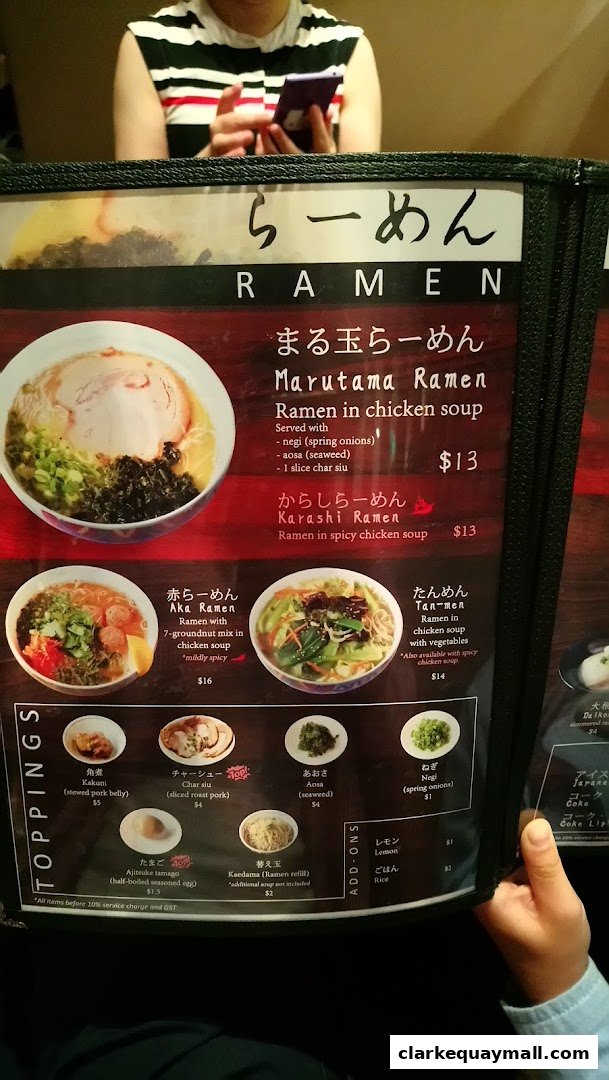 A menu for Marutama Ramen featuring various ramen dishes and toppings.