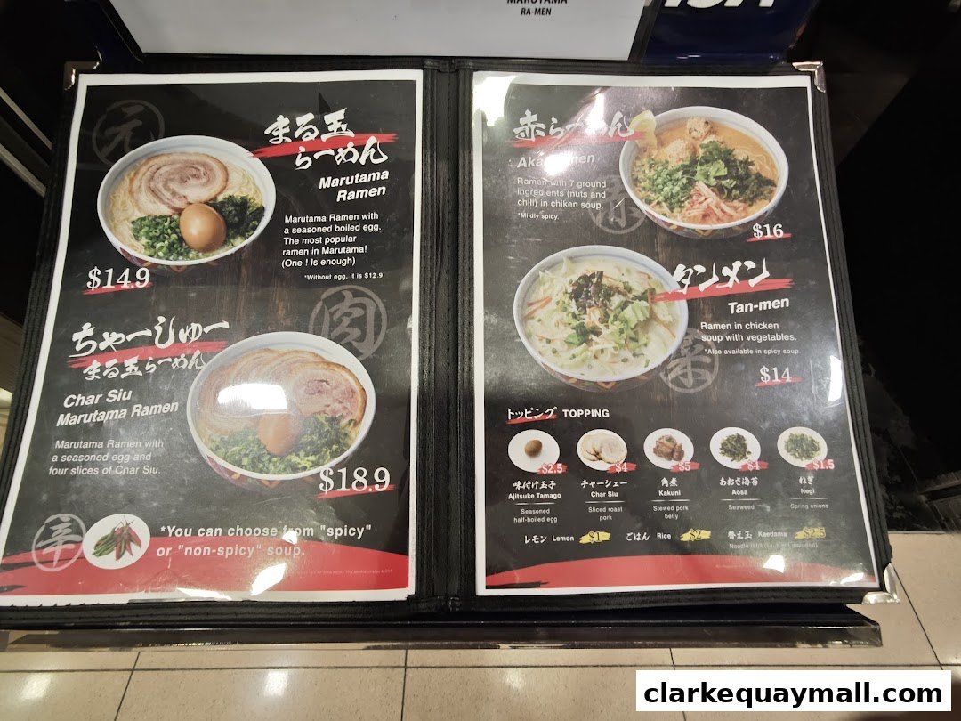 A menu displaying various ramen dishes and toppings with prices.
