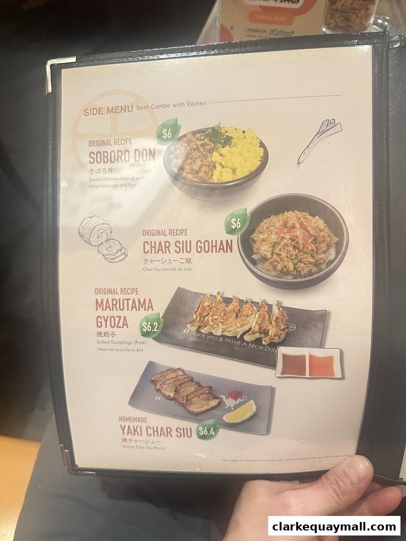 A menu featuring ramen side dishes like Soboro Don, Char Siu Gohan, Gyoza, and Yaki Char Siu.