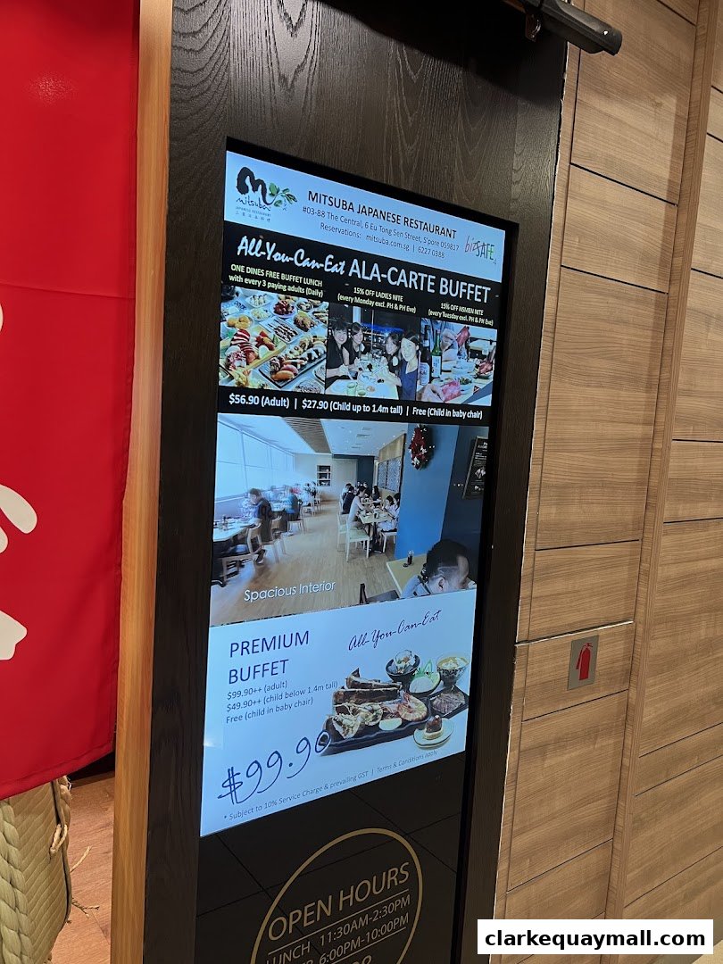 Digital menu board for Mitsuba Japanese Restaurant showcasing buffet options and pricing.
