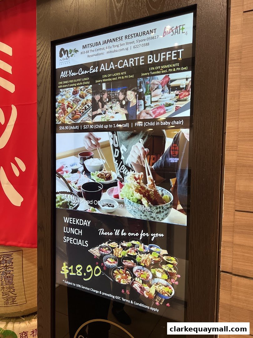 A digital menu board for Mitsuba Japanese Restaurant showcasing buffet and lunch specials.