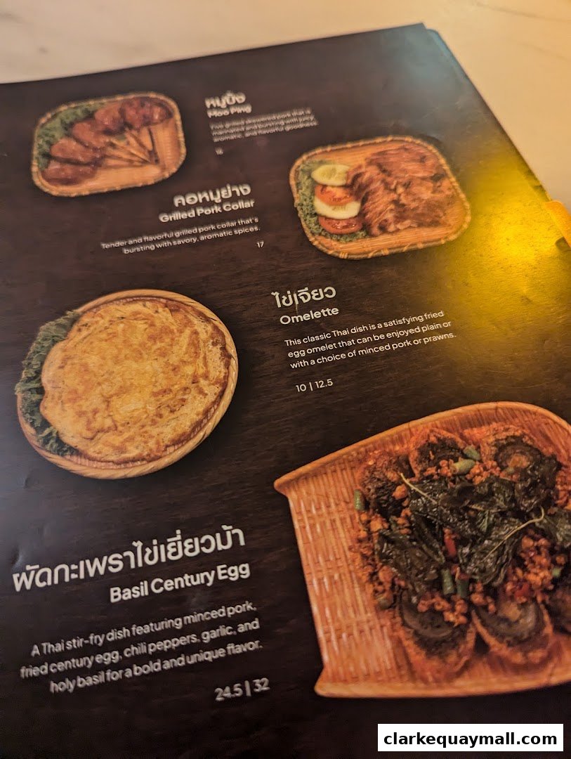 A menu page from Nana Thai Royale Clarke Quay featuring Thai dishes.