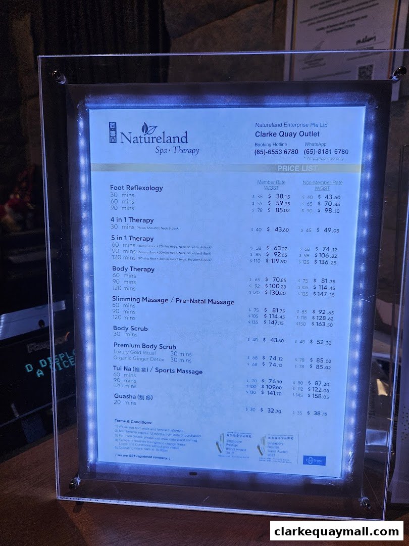 A price list for Natureland Spa Therapy, featuring various massage and therapy services with member and non-member rates.