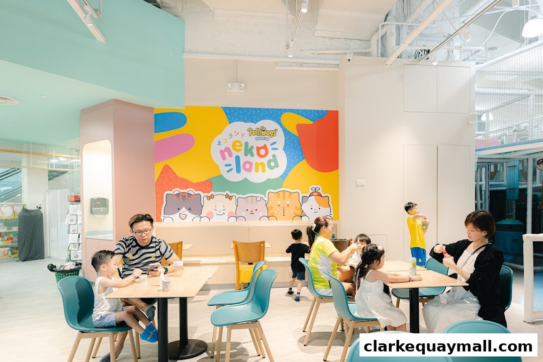 Families enjoying a playful atmosphere at Nekoland By The Polliwogs with colorful decor.
