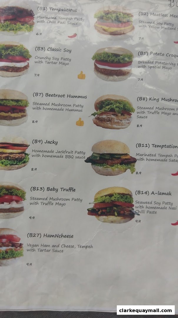 A menu featuring various vegan burgers with detailed descriptions and prices.
