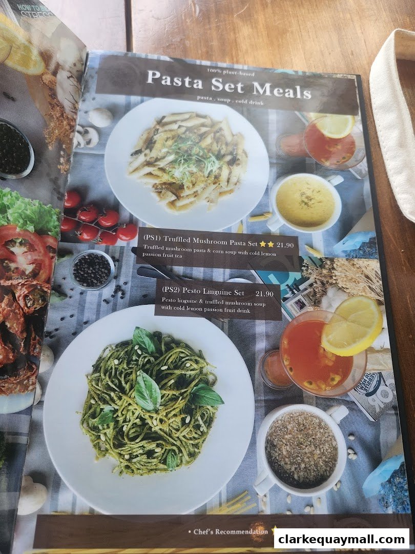 A menu featuring plant-based pasta set meals with soup and drink options.