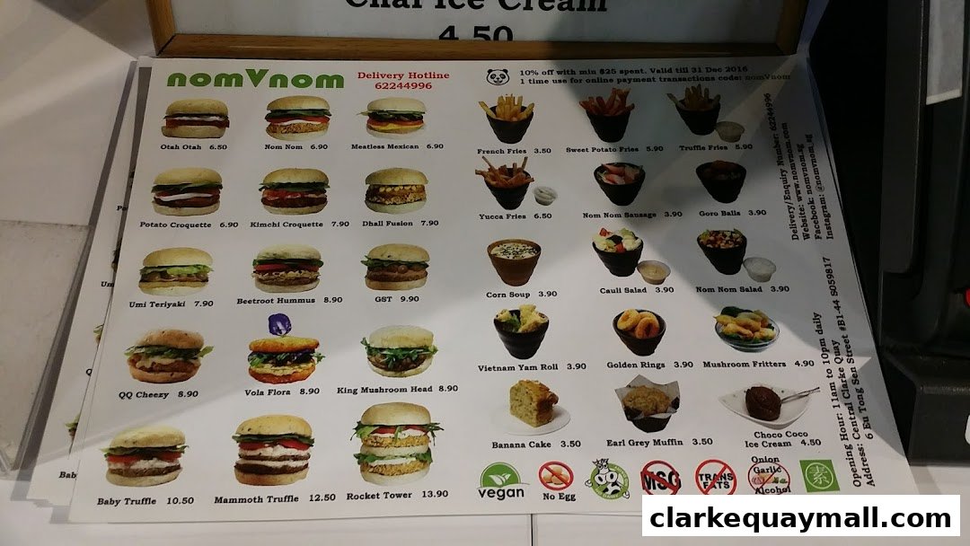 A menu from nomVnom Bistro showcasing various burgers, sides, and desserts with prices.