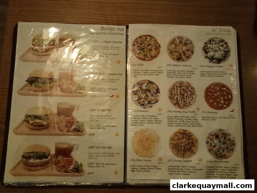 A menu featuring burger sets and 10-inch pizzas with various toppings and ingredients.