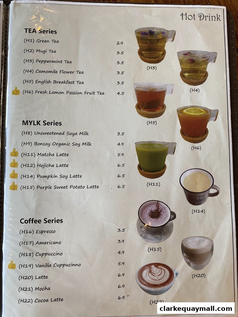 A menu from nomVnom Bistro featuring a variety of hot drinks, including teas, soy milk beverages, and coffees.
