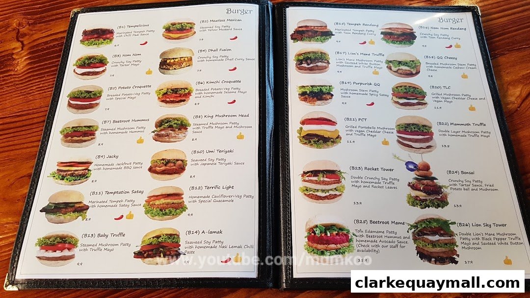 A menu from nomVnom Bistro featuring a variety of gourmet burgers with detailed descriptions and images.