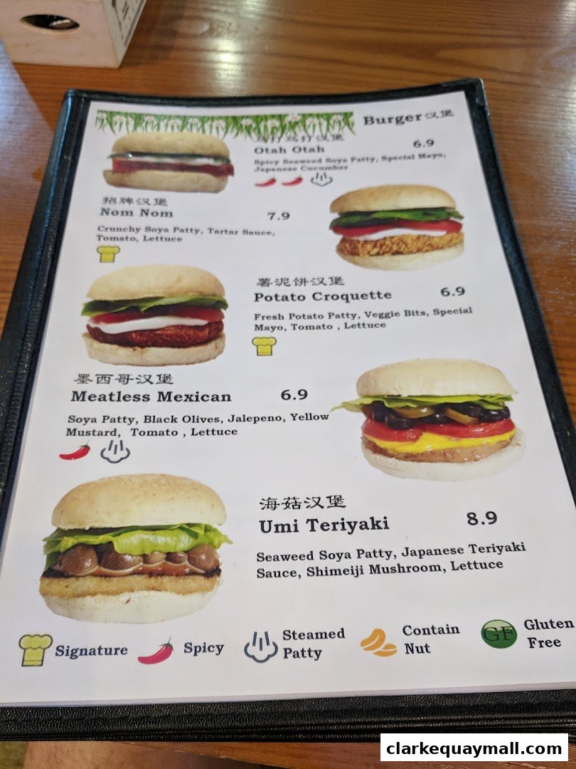 A menu featuring various burgers with descriptions and prices.