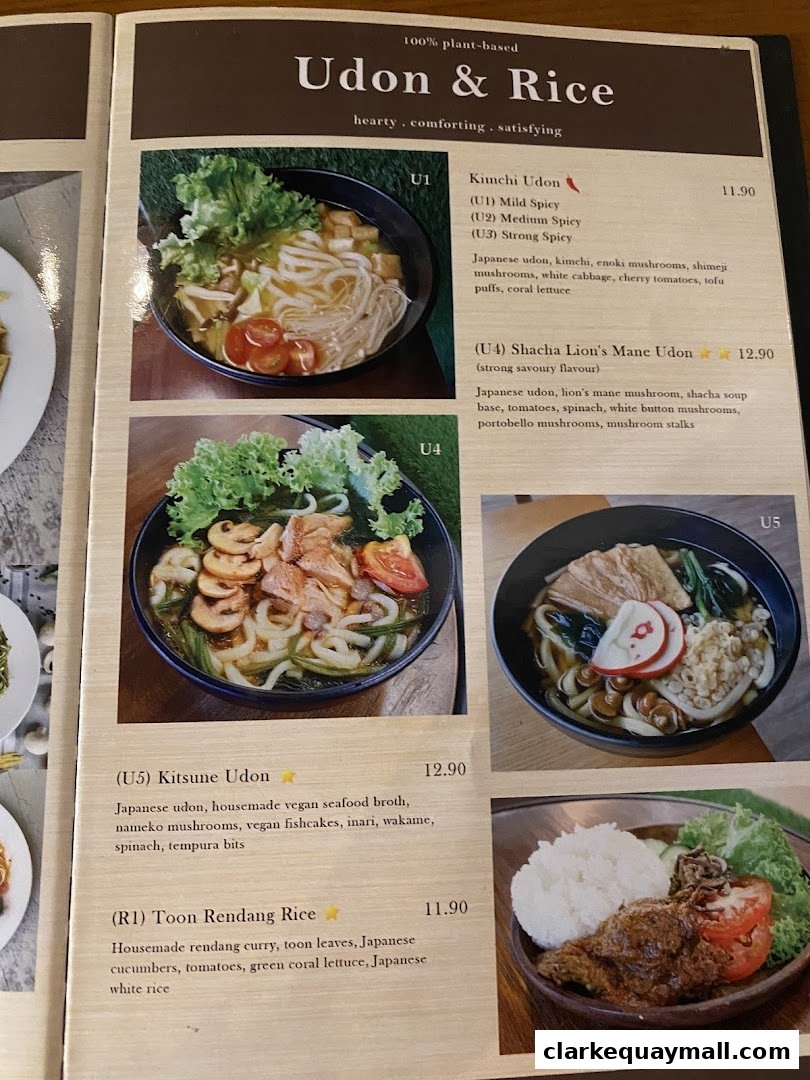 A menu page showcasing plant-based Udon and Rice dishes with enticing descriptions and prices.