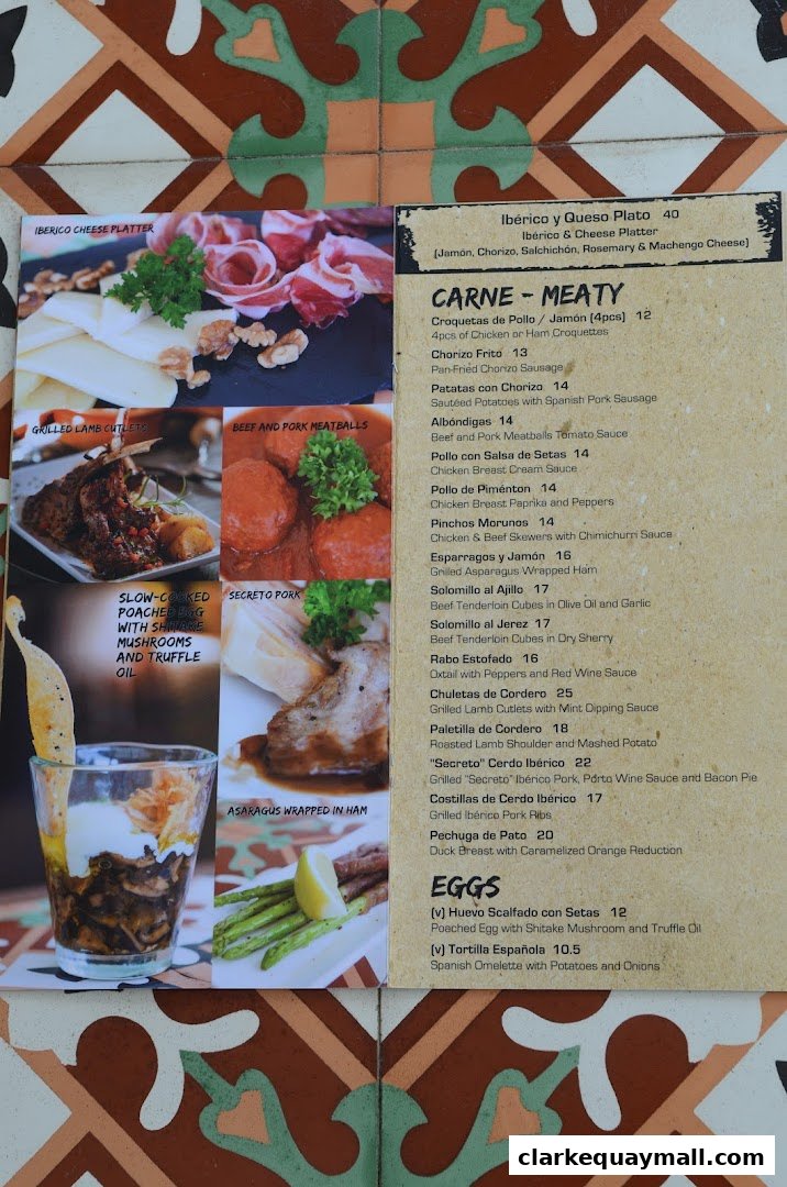 A menu from Octapas featuring a variety of tapas dishes, including meat and egg options.