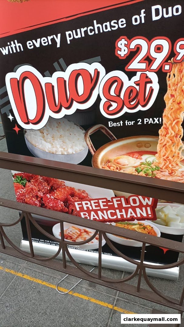 A promotional sign for a Korean street dining restaurant featuring a Duo Set for two.