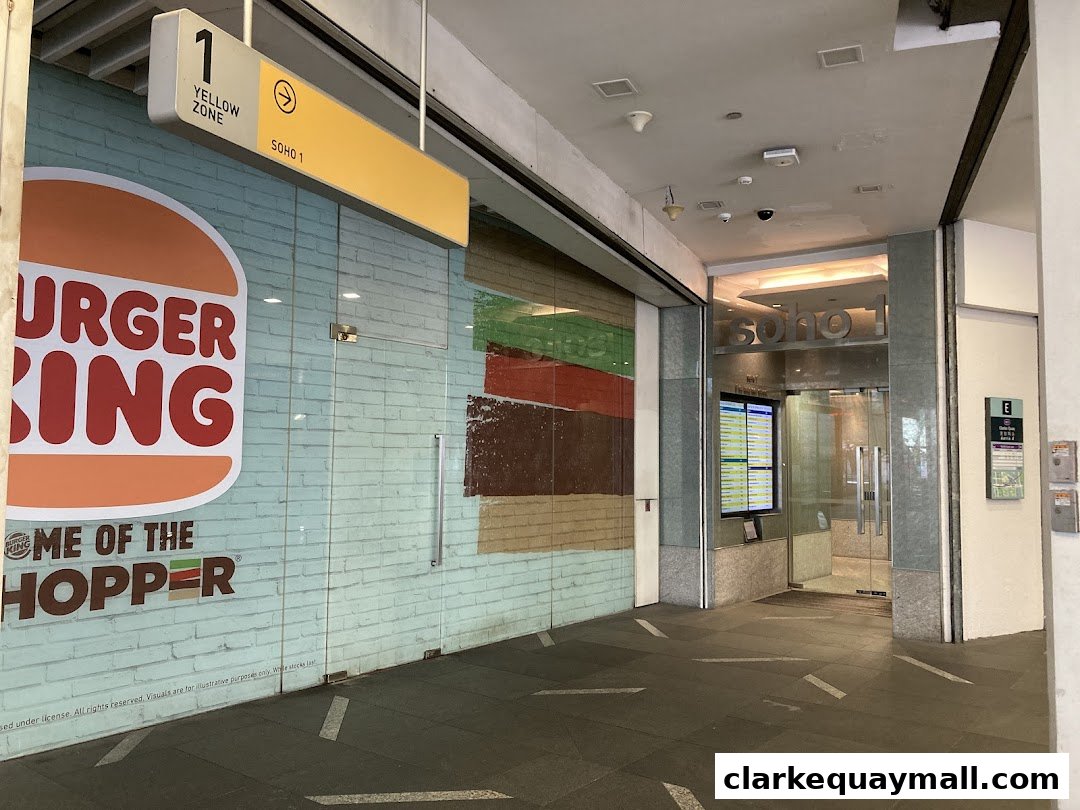 Exterior of a Burger King restaurant and the entrance to Soho 1.