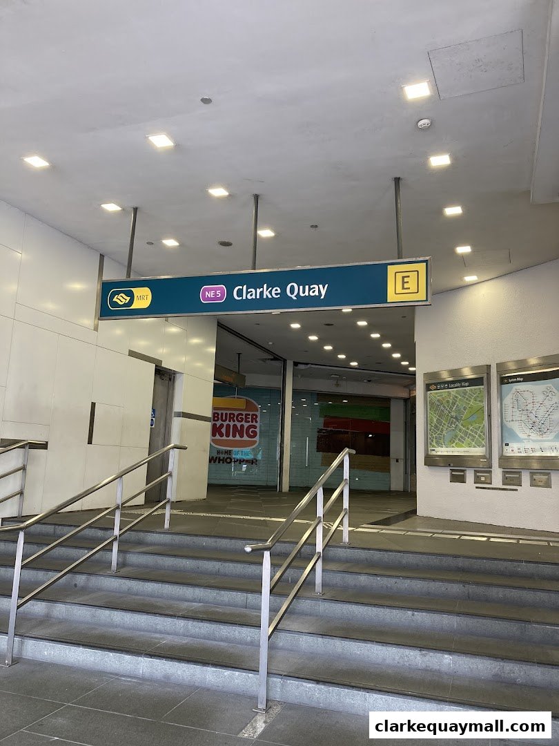 Entrance to Clarke Quay MRT station with Burger King visible inside.