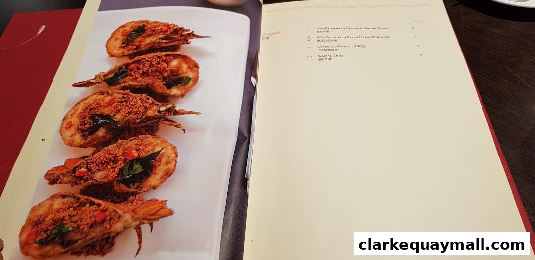 A menu page featuring a dish of fried crayfish and a list of seafood options.