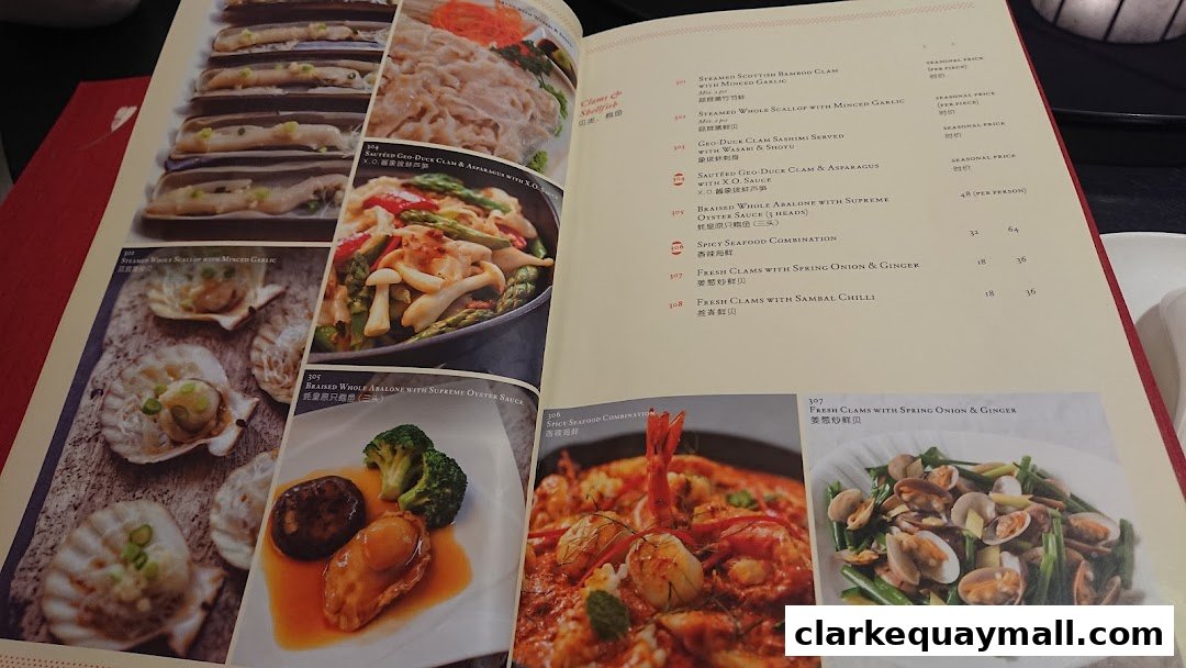 A menu from Red House Seafood Nanyang Clarke Quay featuring various seafood dishes with images.