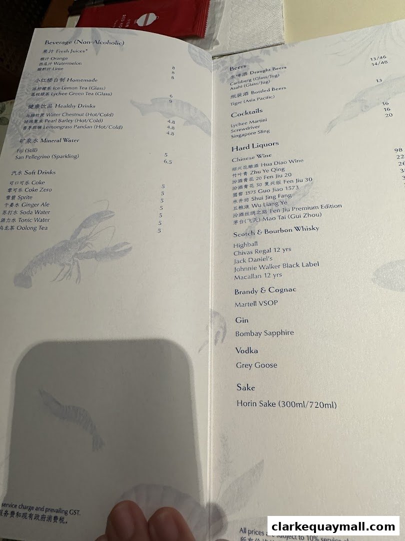 A menu from Red House Seafood Nanyang Clarke Quay featuring beverages, beers, cocktails, and hard liquors.