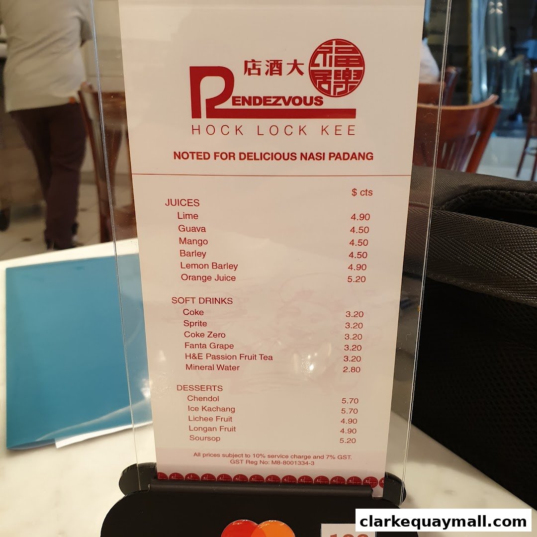 A menu from Rendezvous Restaurant Hock Lock Kee, featuring juices, soft drinks, and desserts.