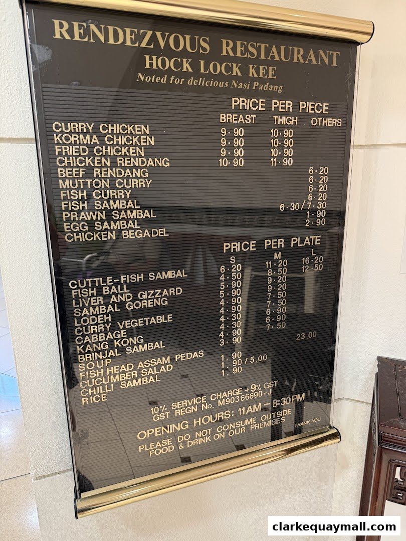 A menu board for Rendezvous Restaurant Hock Lock Kee, listing prices for various dishes.