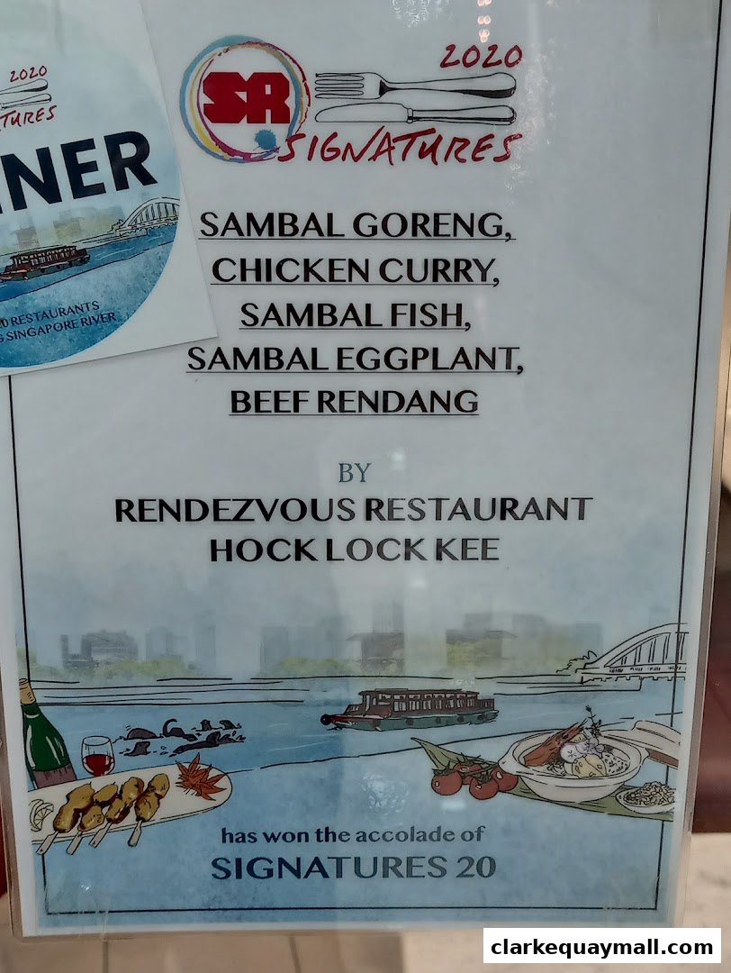 A sign announcing Rendezvous Restaurant Hock Lock Kee's award for Signatures 20.