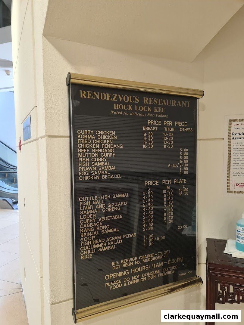 A menu board for Rendezvous Restaurant Hock Lock Kee, featuring prices for various dishes.