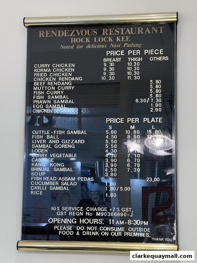 A menu board for Rendezvous Restaurant Hock Lock Kee, featuring Nasi Padang dishes.
