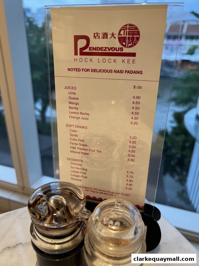 A menu from Rendezvous Restaurant Hock Lock Kee, featuring juices, soft drinks, and desserts.