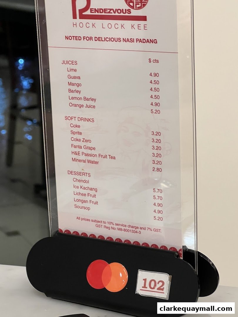 A menu for Rendezvous Restaurant Hock Lock Kee, featuring juices, soft drinks, and desserts.