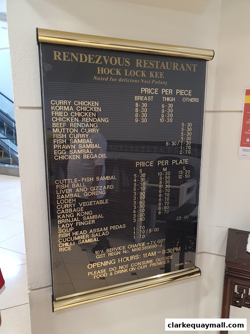 A menu board for Rendezvous Restaurant Hock Lock Kee, featuring Nasi Padang dishes.