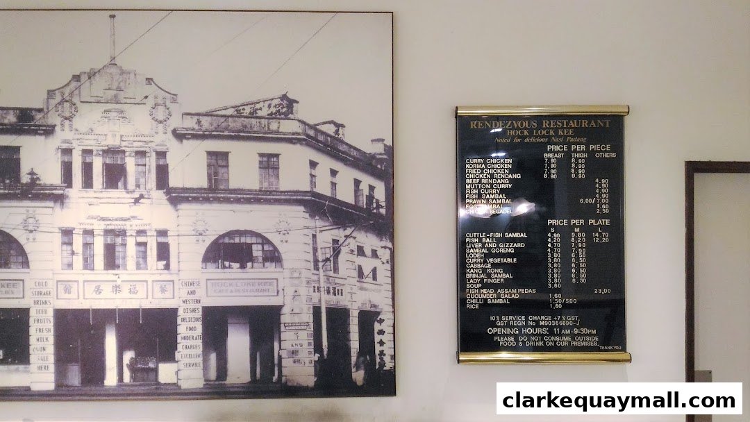A menu board for Rendezvous Restaurant Hock Lock Kee, featuring various dishes and prices.