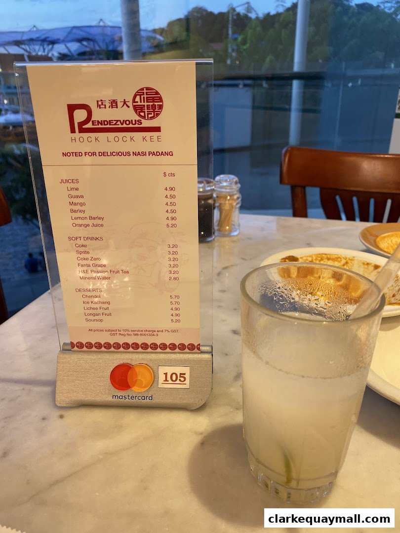 A menu from Rendezvous Hock Lock Kee restaurant featuring juices, soft drinks, and desserts.