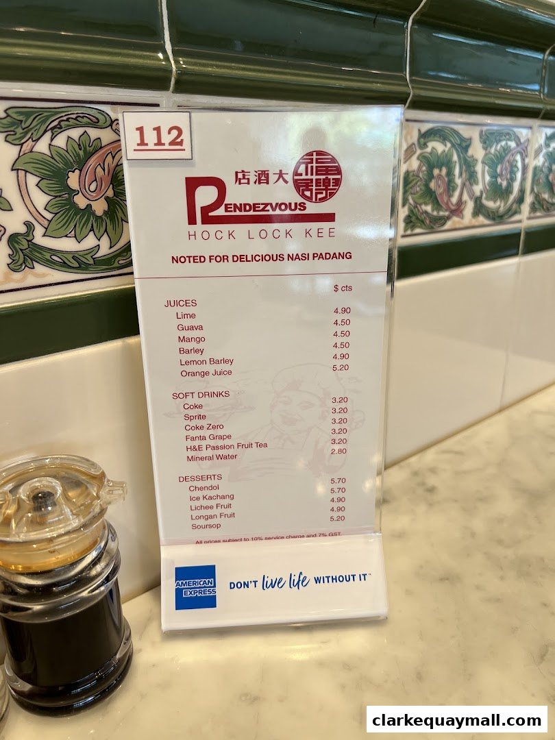 A menu for Rendezvous Hock Lock Kee restaurant, featuring juices, soft drinks, and desserts.