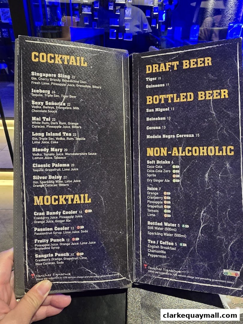 A menu from Rico Rico Clarke Quay featuring cocktails, mocktails, draft and bottled beers, and non-alcoholic drinks.