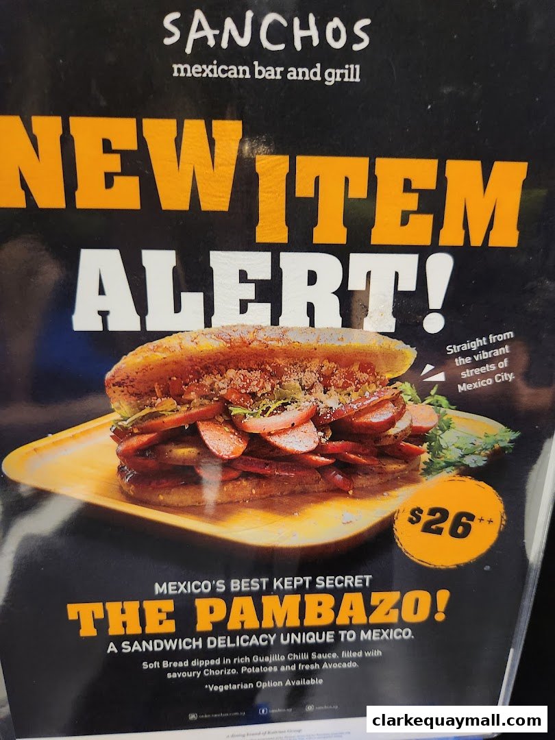 A promotional poster for Sanchos Mexican Bar and Grill featuring their new Pambazo sandwich.
