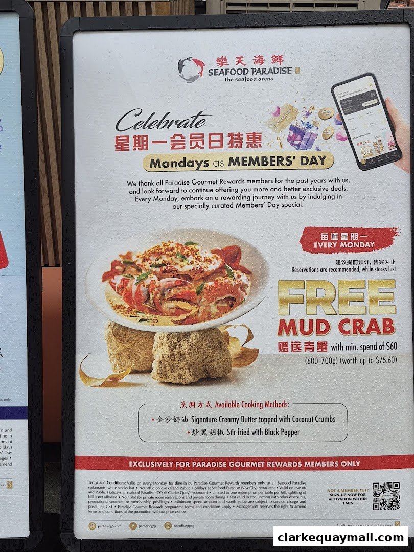 Promotional poster for Seafood Paradise offering a free mud crab on Mondays for members.
