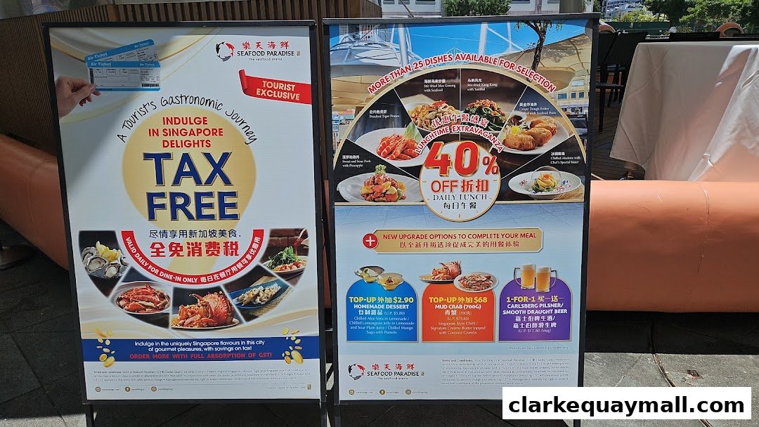 Two promotional boards for Seafood Paradise, one advertising tax-free dining and the other a lunch promotion.