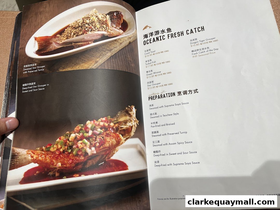 A menu page showcasing two beautifully prepared fish dishes and a list of fresh catch options.