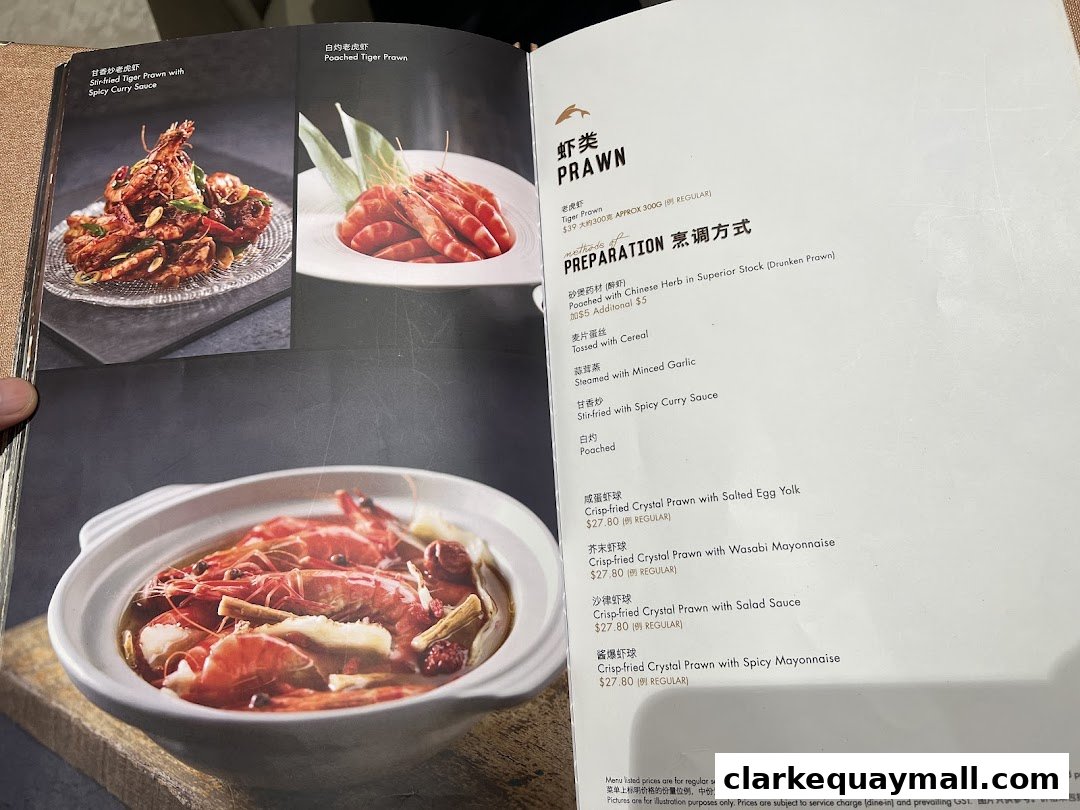 A menu page from Seafood Paradise featuring various prawn dishes with enticing images.
