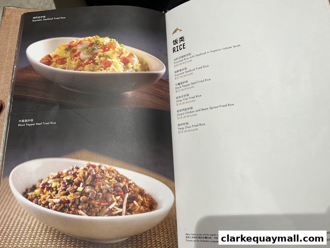 A menu page from Seafood Paradise featuring various rice dishes with appetizing images.