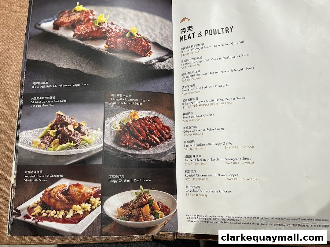 A menu page from Seafood Paradise featuring meat and poultry dishes with enticing food photography.