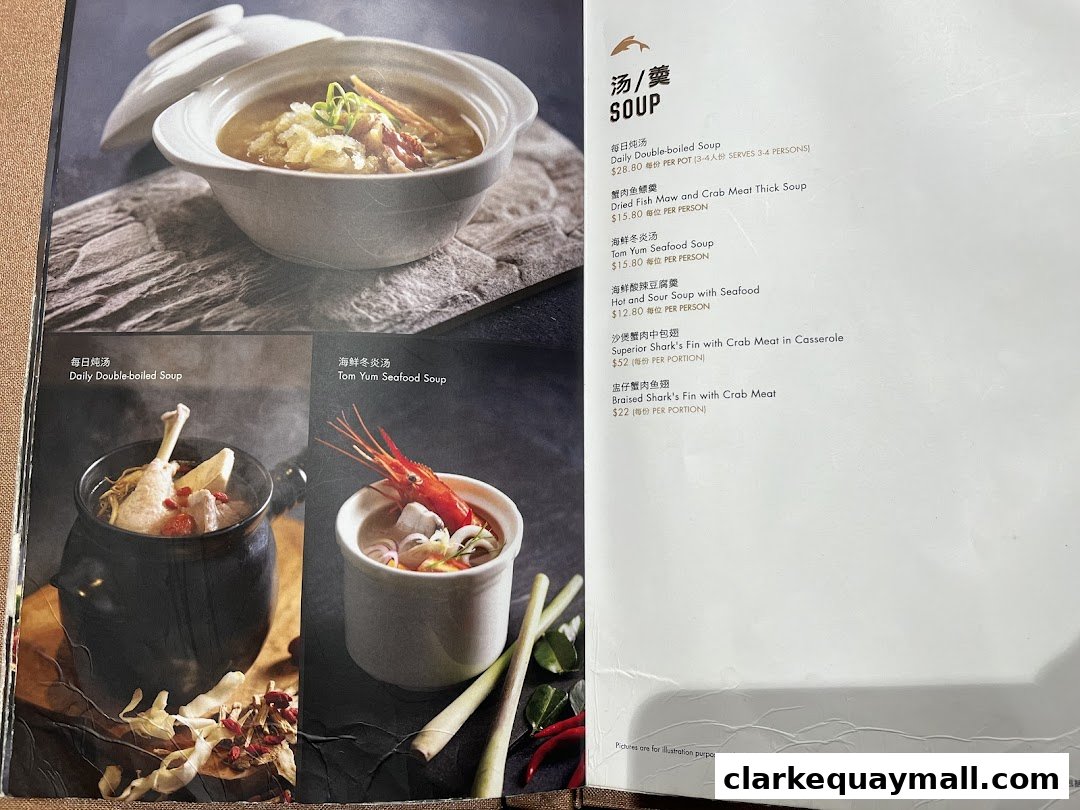 A menu page from Seafood Paradise featuring various soups with enticing images.