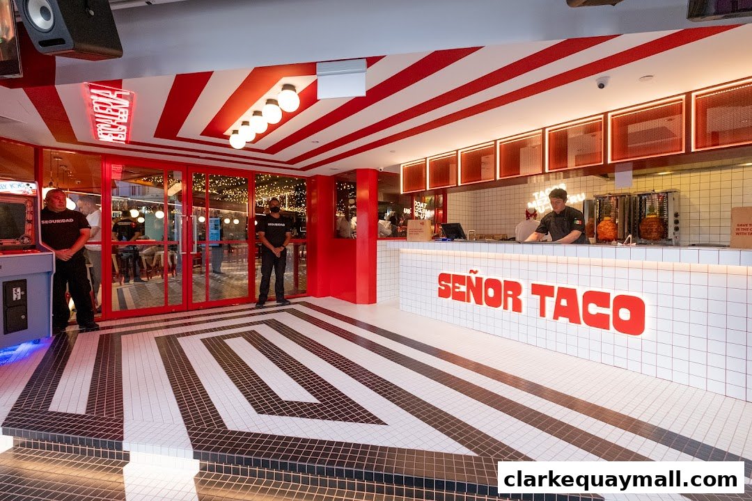 The entrance and counter area of Señor Taco, a vibrant Mexican restaurant with red and white decor.