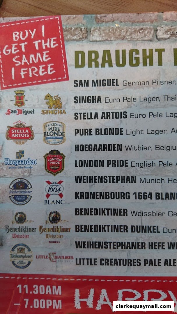 A menu board displaying various draught beers with their descriptions and a 'Buy 1 Get 1 Free' offer.